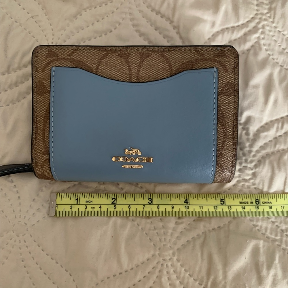 Small Coach wallet. Barely used. From non-smoking home.